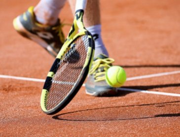 Magasin spécialisé en raquettes de tennis à Montagny